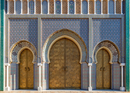 Unless you have a special invitation to the palace grounds, you'll have to settle for admiring its seven imposing front gates, surrounded by fine tilework and carved cedar wood. Golden door in Fes.