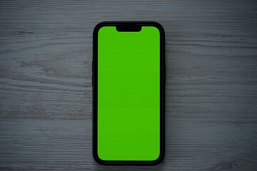 mobile phone with green screen, phone close-up, green screen for background replacement