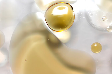 Drops of oil are on the surface of the water.
