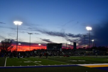 Sunset Over a Sports Stadium