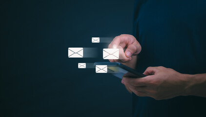 businessmen use their mobile phones to check newsletters or emails each day. For communication or...
