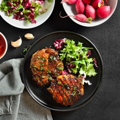 Roasted pork steak with vegetable salad