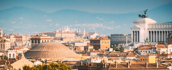 Rome, Italy. Sloping Roof Of Pantheon And Altar Of The Fatherland In Cityscape Of Town.