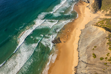 Aerial droe view of beautiful natural Cordoama beach in Portugal Atlantic coast - 778288787