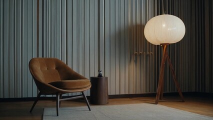 design scene with a chair,A chair, a lamp, and a waste bin are placed in a room. The wall is covered with vertical stripes.