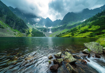 mountains with three lakes and waterfalls flowing down from them, a wide angle photo of mountain...