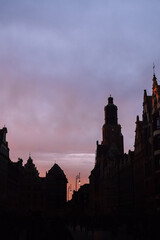 Silhouettes of Wroclaw, Poland. Historical market square and a magical pink sunset. - 778299923