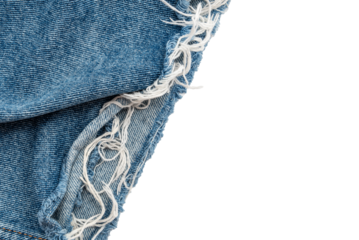 Piece of torn denim on a white background. Denim texture