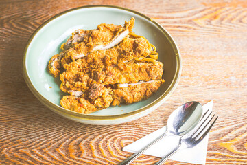 All time favourite chicken Cutlet with mala spice on top of  fettucine