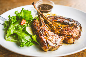 Chargrilled Lamb Rack .Cucumber mint yoghurt, mashed potato,mesclun salad, mushroom  sauce