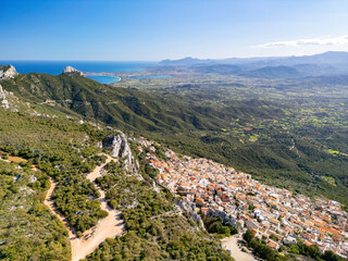 Picturesque village in the mountains of Baunei in Italy, in the region of Sardinia, in the province of Nuoro, aerial view from drone
