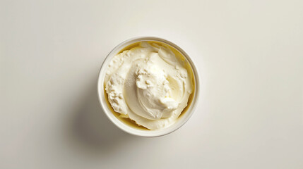 Fresh ricotta cheese container opened on white background. Visible creamy texture, mild flavor. Design for culinary versatility, food marketing.
