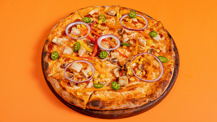 Vegetables pizza isolated on orange background