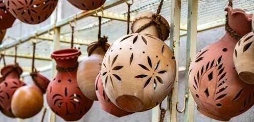 Fotobehang Lengtemeter Traditional pottery on Nizwa Souq, Oman