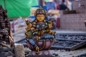 A handmade wooden idol of Goddess Krishna sounds like a beautiful Laxmi to the deity's revered presence in Hindu mythology and culture. 