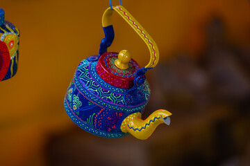Handicraft work, Teas cattle painted with handmade colours with traditional tribal art on display...
