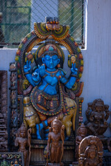 A handmade wooden idol of Lord Krishna sounds like a beautiful tribute to the deity's revered presence in Hindu mythology and culture. 