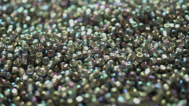 Iridescent Seed Beads Close-up - First-Person View