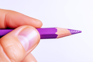 Hand holding a purple pencil, business economy financial concept