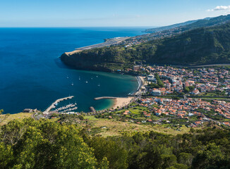 View from Pico do Facho viewpoint over the Machico valley, Airport in the background, Madeira, Portugal - obrazy, fototapety, plakaty