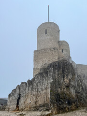 Castle ruins in Rabsztyn in Poland in rainy and foggy weather. The facility near Olkusz on the Eagle's Nests trail on the Krakow-Czestochowa Upland