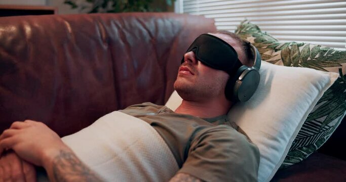 Psychedelic therapy, psychology and man with headphones and eye mask for depression, anxiety and sleep. Mental health, counseling and person for natural medicine, psilocybin treatment and microdosing