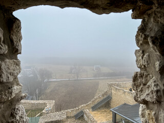 Castle ruins in Rabsztyn in Poland in foggy weather. The facility near Olkusz on the Eagle's Nests trail on the Krakow-Czestochowa Upland - 778346351