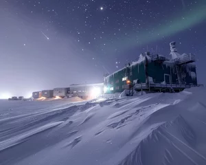 Fotobehang Arctic base under aurora skies, cold frontier of science © Jiraphiphat