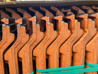 Roof tiles stacked on a pallet, visible from the side as a background - 778352302