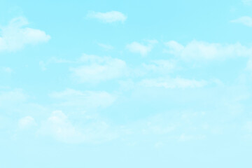 Blue pastel sky with white fluffy cloud. Cloudscape background. Soft cumulus clouds backdrop....