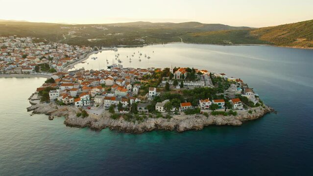 Aerial view of the picturesque Primosten town at sunrise, Adriatic sea, Croatia