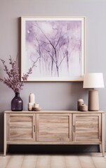 Minimalist wooden commode with pastel watercolor painting of trees and pink flowers in vase on it and a ceramic lamp