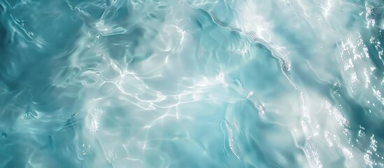 Top view, blue water is white with ripples on the surface. Defocus white transparent blurred calm...