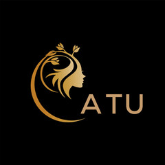 ATU letter logo. best beauty icon for parlor and saloon yellow image on black background. ATU Monogram logo design for entrepreneur and business.	
