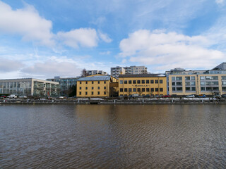 A beautiful view on the shore of Aura river on a sunny spring day. Turku, Finland