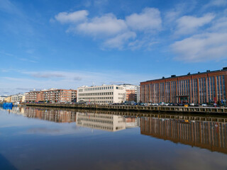 A beautiful view on the shore of Aura river on a sunny spring day. Turku, Finland
