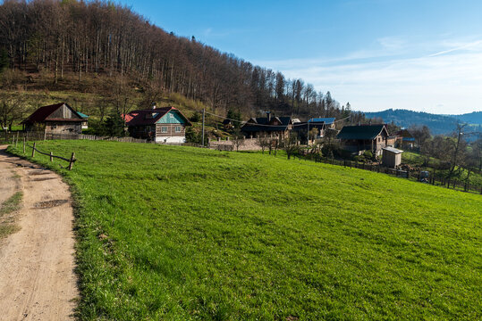 Small settlement with few wooden houses in mountains in Slovakia - Kycera settlement in Javorniky mountains
