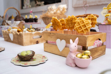 Easter candy table.. Typical Easter sweets on a festive celebration table. There are Easter eggs...