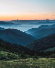 Sunset over majestic mountain peaks.