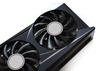 A black and white video card on a white background. Fans and the graphics card case. Computer...