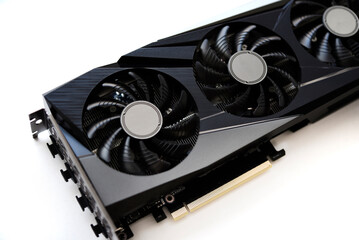 A black and white video card on a white background. Fans and the graphics card case. Computer...