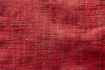 A canvas showcasing a red hessian (jute) fabric texture. 32k, full ultra HD, high resolution - obrazy, fototapety, plakaty