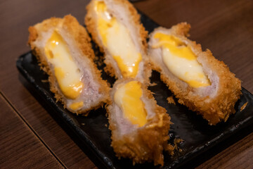 Cheese cutlet, Fried cheese serve on plate in restaurant