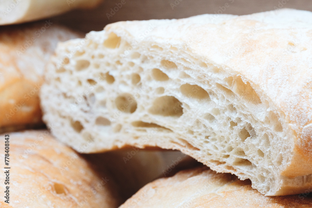 Aufkleber a slice of bread with a hole in it. the bread is white and has a hole in the middle