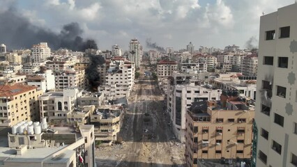Gaza city Rimal neighborhood destroyed in the war, aerial wide shot,
Drone view over North Gaza buildings bombarded,Gaza-March,20,2024
