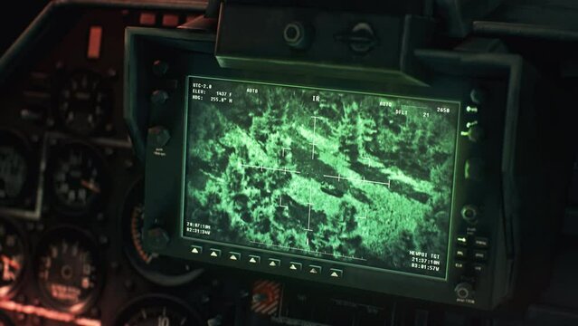 Night vision radar inside the military helicopter scouting the designated area. Night vision military helicopter system looking for the enemy. Night vision military helicopter tech destroying a target