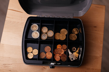 German money coins in an iron portable safe
