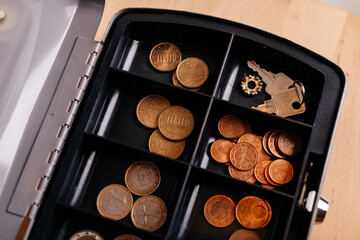 German money coins in an iron portable safe