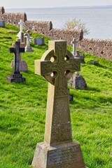 celtic cross on a cemetery