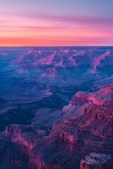 a large canyon with pink and purple colors